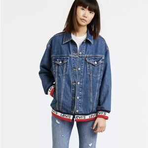 Levi’s Baggy Sport Tape Trucker medium wash denim jacket. Sz. M